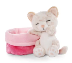 Soft toy kitty with leopard print sleeping in basket