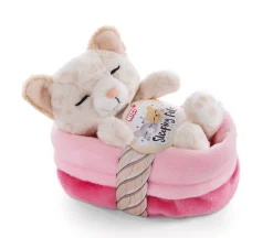 Soft toy kitty with leopard print sleeping in basket