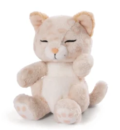 Soft toy kitty with leopard print sleeping in basket