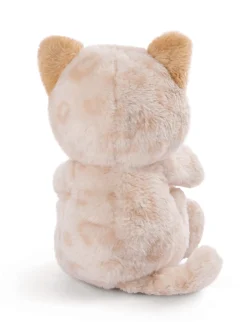 Soft toy kitty with leopard print sleeping in basket