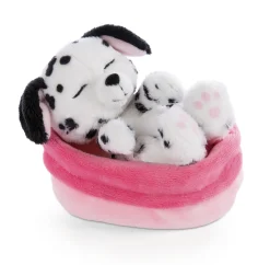 Soft toy puppy dalmatian sleeping in basket