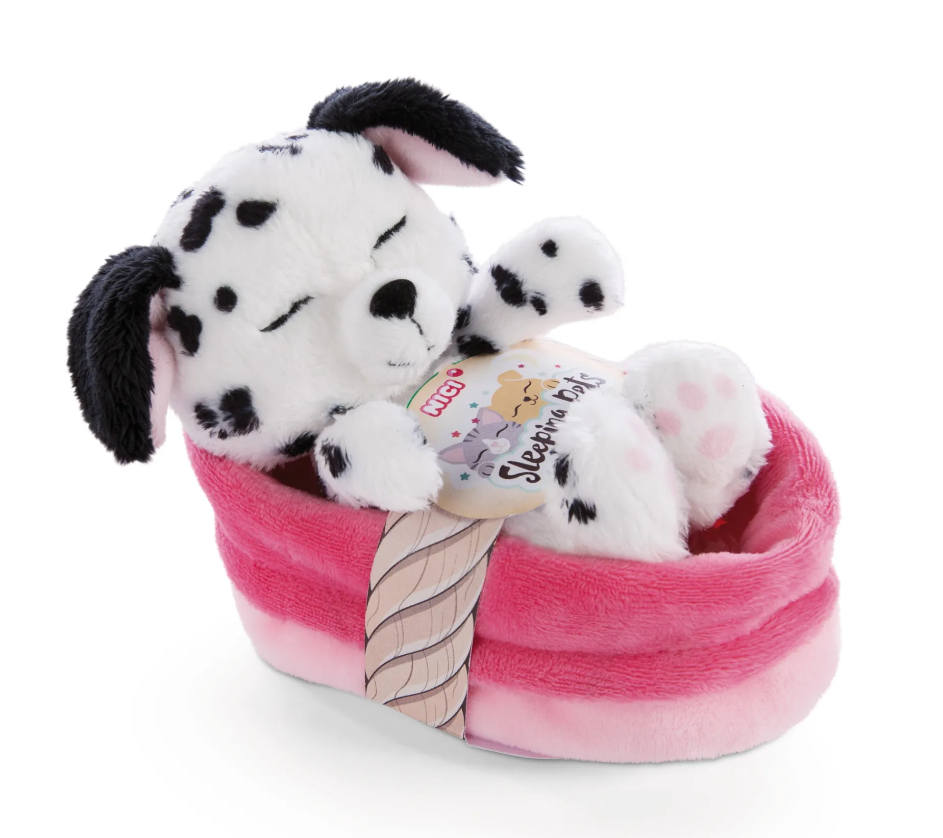 Soft toy puppy dalmatian sleeping in basket