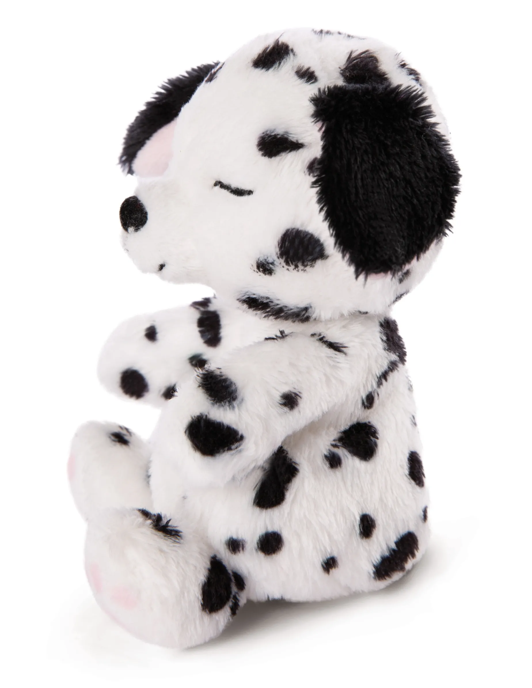 Soft toy puppy dalmatian sleeping in basket